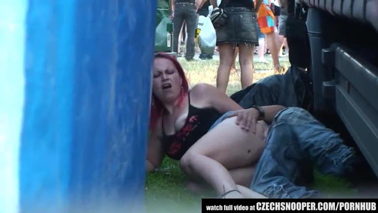 Pink hair slut caught fucking a guy in public during concert