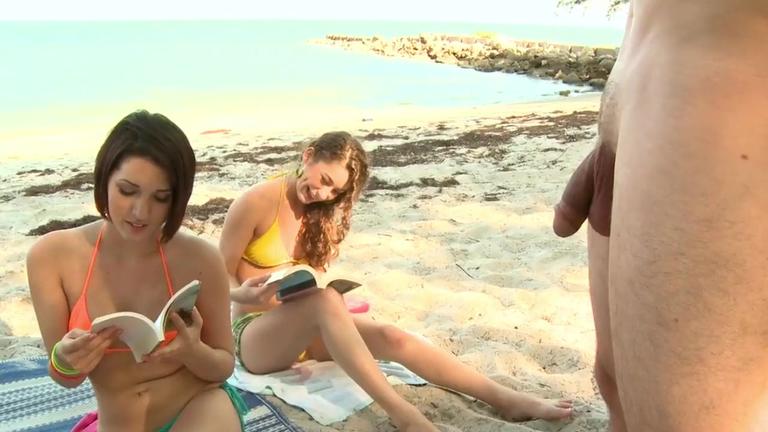 Brandi Belle and her friends playing with a dick on the beach