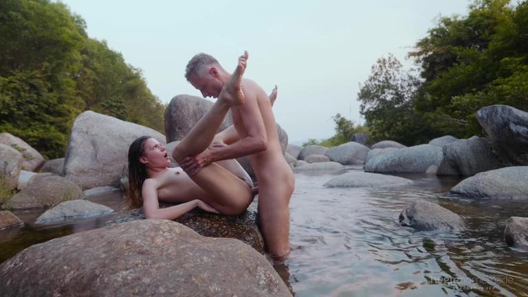 Hot naked couple enjoys natural sex in secret waterfall