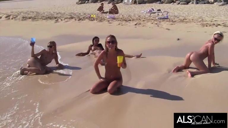 Six crazy lesbians eating pussy, fingering and pissing on a public beach