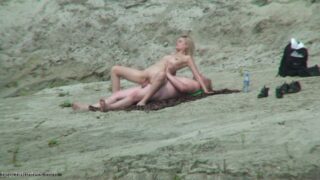 Hot Blonde Caught Riding Her Boyfriend’s Cock On Nude Beach